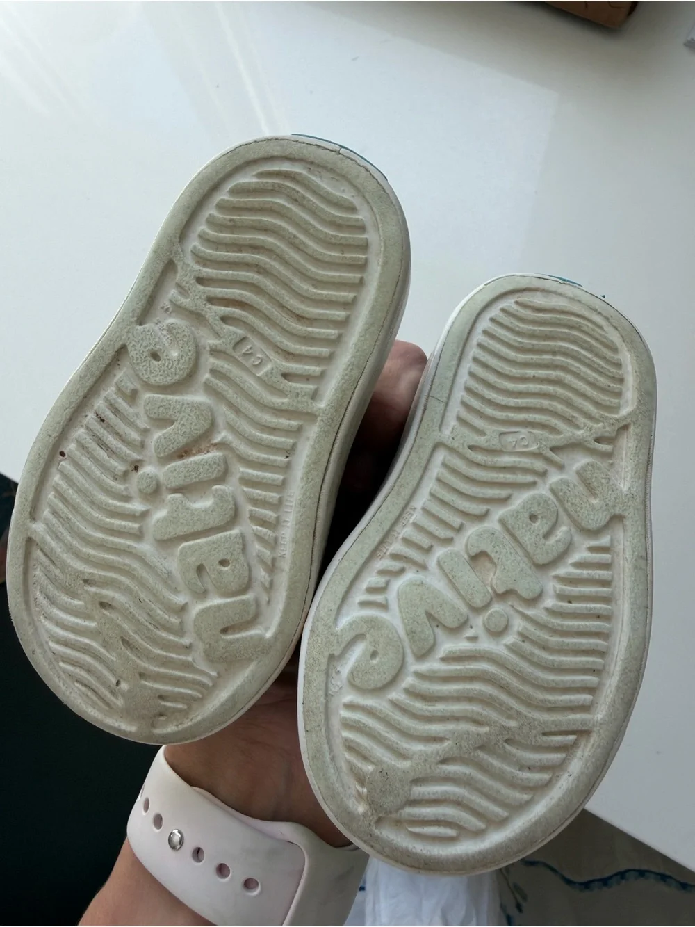 Native Kids Black Slip-On Water Shoes with White Soles and Teal Logo
